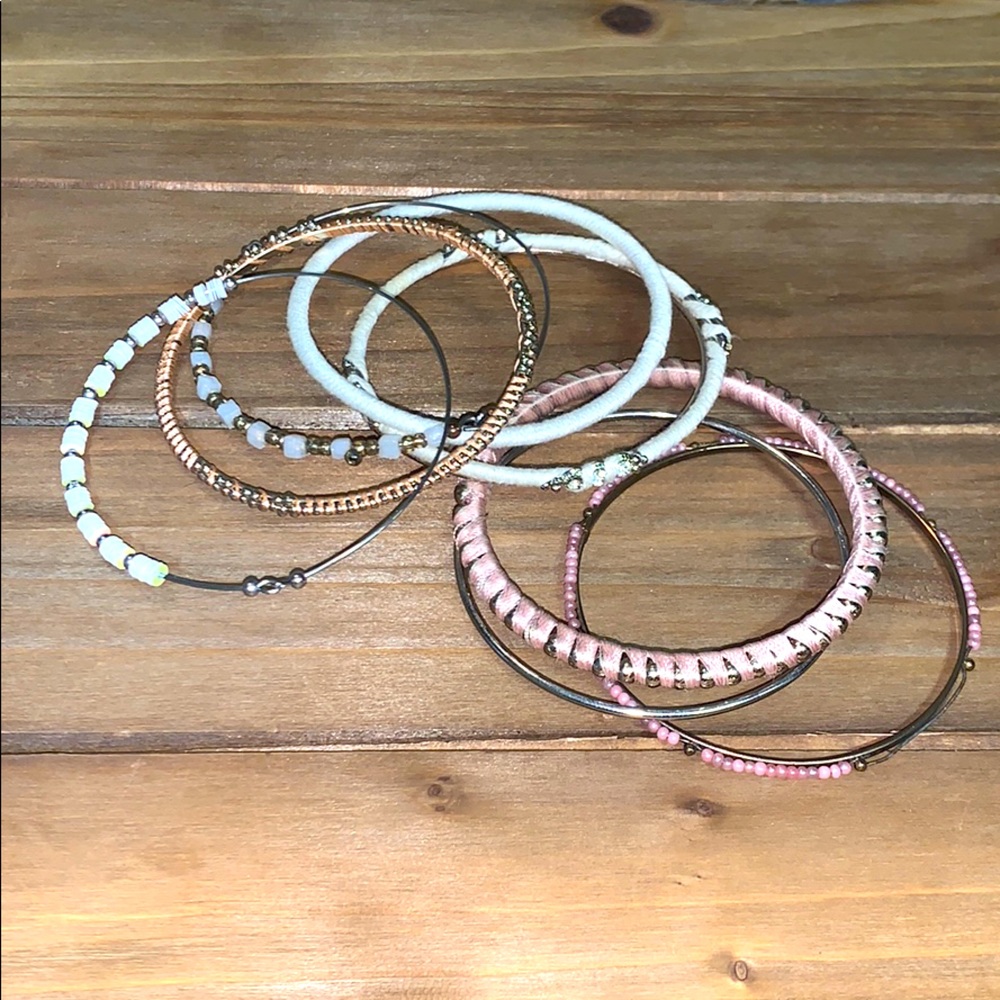 Stack of bracelets from LOFT, pink, gold, white